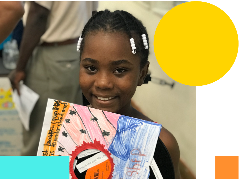 Happy girl showing drawing