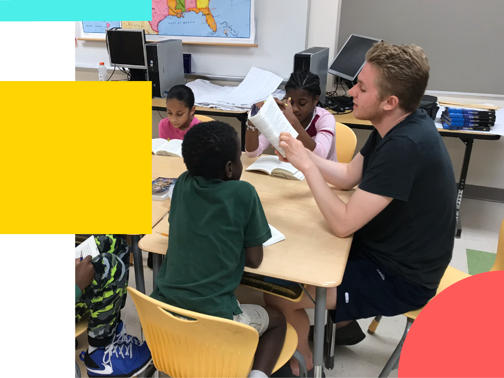 Big buddy reading with little buddies